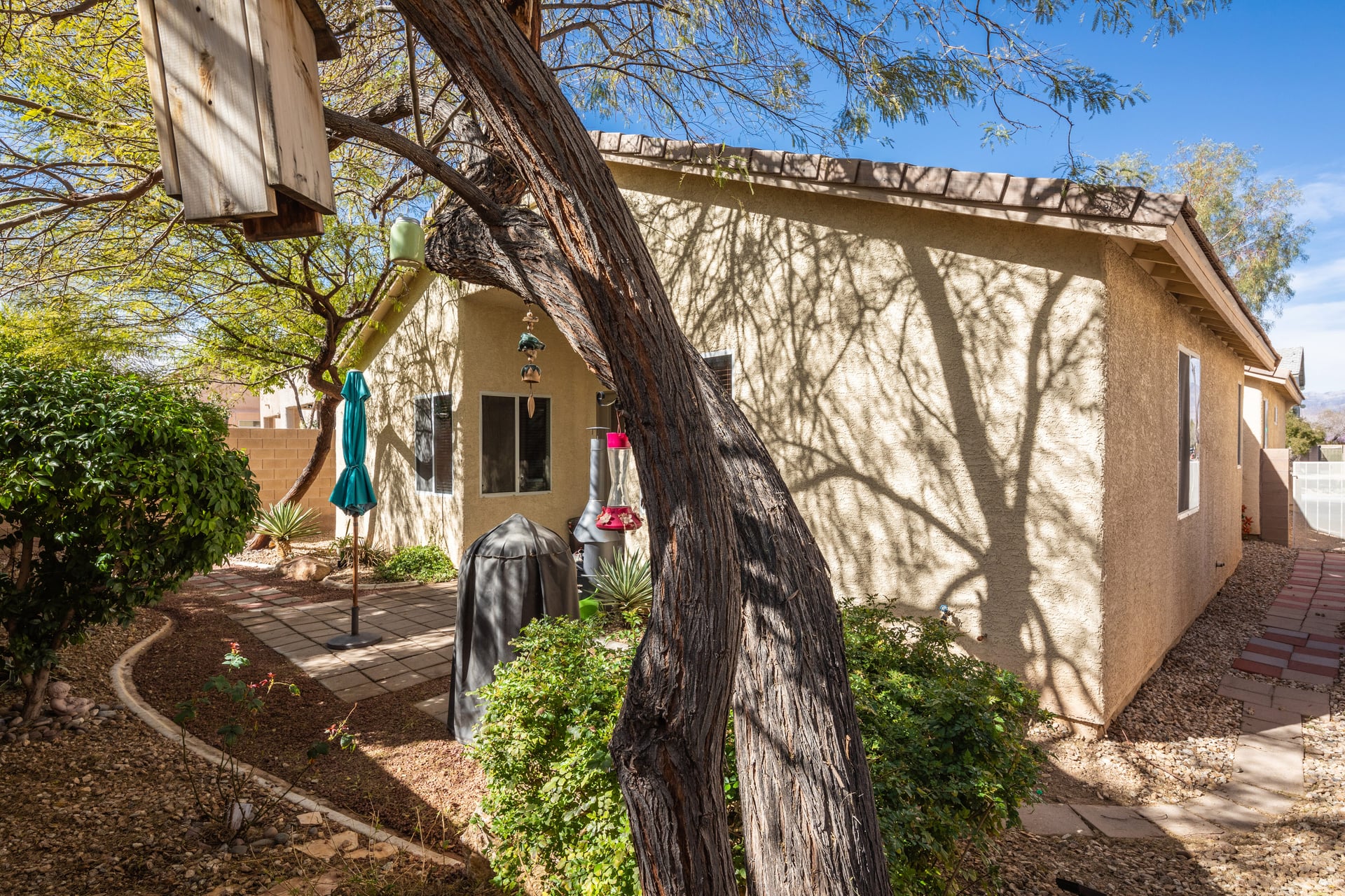 Architectural details of home exterior with landscaping